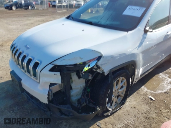 2015 Jeep Cherokee Latitude with VIN 1C4PJLCBXFW506502, listed as a IAAI auction lot 42103117 with 160,433 mi miles and . Bid and sale history available at carsss.com. Image 6.