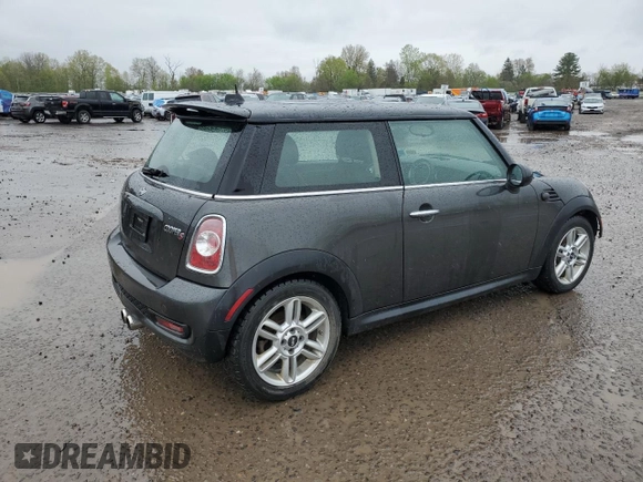 2013 MINI Hardtop S with VIN WMWSV3C50DT477984, listed as a Copart auction lot 56190855 with 98,878 mi miles and Salvage Title. Bid and sale history available at DreamBid. Image 3.