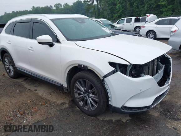 2021 Mazda CX-9 Signature with VIN JM3TCBEY4M0517118, listed as a IAAI auction lot 42400675 with 56,260 mi miles and . Bid and sale history available at DreamBid. Image 1.
