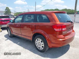 2014 Dodge Journey American Value Pkg with VIN 3C4PDCAB6ET248820, listed as a IAAI auction lot 39159166 with 215,007 mi miles. Bid and sale history available at carsss.com. Image 3.