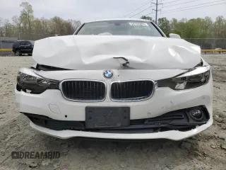 2017 BMW 3 Series 320i xDrive with VIN WBA8E5G5XHNU22436, listed as a Copart auction lot 52702805 with 74,008 mi miles and Salvage title. Bid and sale history available at DreamBid. Image 5.