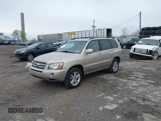 2006 Toyota Highlander Hybrid with VIN JTEEW21AX60007243, listed as a IAAI auction lot 42032134 with 154,901 mi miles. Bid and sale history available at carsss.com. Image 2.
