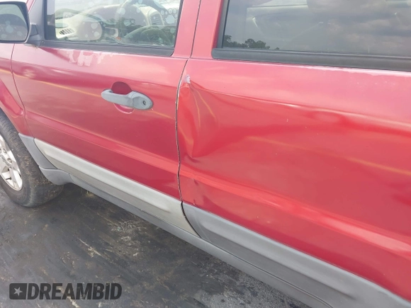 2006 Ford Escape XLT with VIN 1FMYU03136KD09448, listed as a IAAI auction lot 42578120 with 235,521 mi miles and . Bid and sale history available at DreamBid. Image 6.