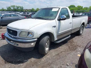 2002 Ford F-150 XL with VIN 2FTRF17W42CA29034, listed as a IAAI auction lot 42134017 with Not Provided miles and . Bid and sale history available at DreamBid. Image 2.