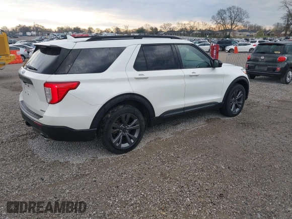 2022 Ford Explorer XLT with VIN 1FMSK8DH6NGC07066, listed as a IAAI auction lot 41856343 with 31,711 mi miles and . Bid and sale history available at DreamBid. Image 4.