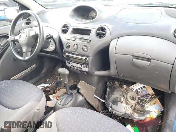 2005 Toyota ECHO z VIN JTDJT123X50066099, wystawiony jako Copart lot #74203284 z przebiegiem 134 249 mil mil oraz Szkoda całkowita • Salvage title. Historia ofert i sprzedaży dostępna na DreamBid. Obrazek 8.