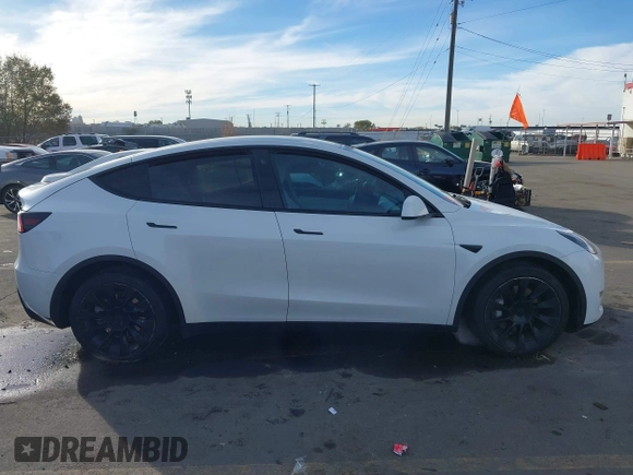 2021 Tesla Model Y Long Range with VIN 5YJYGDEE3MF098586, listed as a IAAI auction lot 40939802 with Not Provided miles and . Bid and sale history available at DreamBid. Image 12.