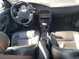 2001 Saturn SL z VIN 1G8ZK54701Z301199, wystawiony jako Copart lot #48488335 z przebiegiem 96 151 mil mil oraz Szkoda całkowita • Salvage title. Historia ofert i sprzedaży dostępna na DreamBid. Obrazek 8.