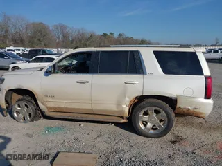 2015 Chevrolet Tahoe LTZ with VIN 1GNSCCKCXFR287609, listed as a IAAI auction lot 41688936 with 112,678 mi miles. Bid and sale history available at carsss.com. Image 15.