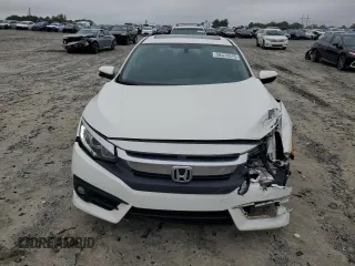 2016 Honda Civic EX-T z VIN 19XFC1F35GE030380, wystawiony jako Copart lot #58374315 z przebiegiem 185 175 mil mil oraz Szkoda całkowita • Salvage title. Historia ofert i sprzedaży dostępna na DreamBid. Obrazek 5.
