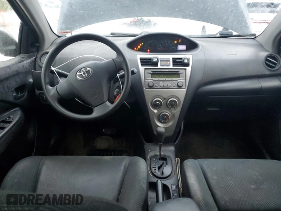 2012 Toyota Yaris with VIN JTDBT4K33CL035567, listed as a Copart auction lot 51837505 with 233,895 mi miles and Salvage Title. Bid and sale history available at DreamBid. Image 8.