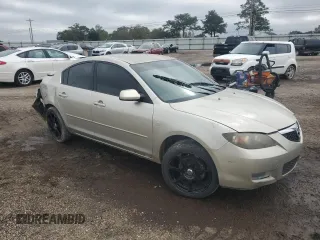 2008 Mazda 3 i Sport with VIN JM1BK12F181790912, listed as a Copart auction lot 79189674 with 289,265 mi miles and Salvage Title. Bid and sale history available at DreamBid. Image 4.