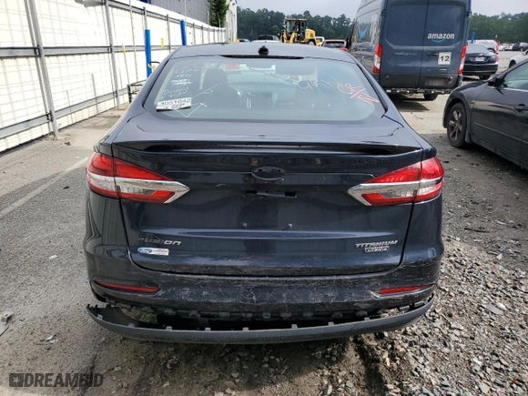 2020 Ford Fusion Plug-In Hybrid Titanium with VIN 3FA6P0SU6LR158133, listed as a Copart auction lot 56468884 with 57,585 mi miles. Bid and sale history available at carsss.com. Image 6.