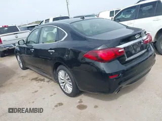 2015 Infiniti Q70 with VIN JN1BY1PP9FM601468, listed as a IAAI auction lot 41745618 with 138,932 mi miles and . Bid and sale history available at DreamBid. Image 3.