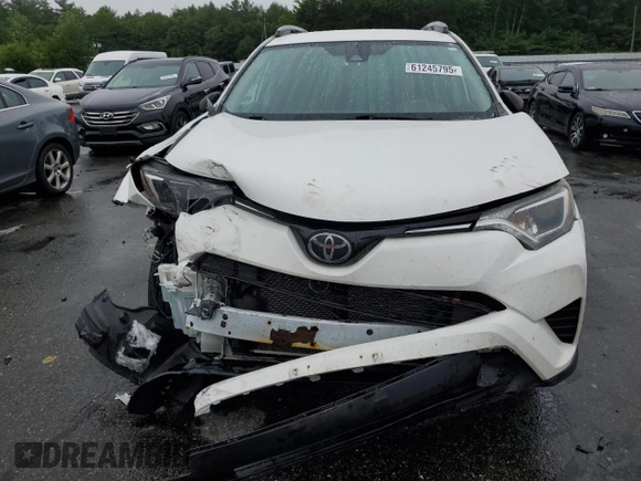 2018 Toyota RAV4 LE with VIN 2T3BFREV2JW853108, listed as a Copart auction lot 61245795 with 174,196 mi miles and Salvage title. Bid and sale history available at DreamBid. Image 5.