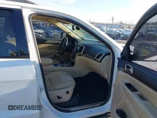 2014 Jeep Grand Cherokee Limited with VIN 1C4RJFBG7EC220677, listed as a IAAI auction lot 41177354 with 148,445 mi miles and . Bid and sale history available at DreamBid. Image 5.