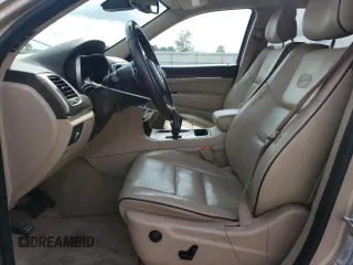 2015 Jeep Grand Cherokee High Altitude with VIN 1C4RJECG3FC800812, listed as a Copart auction lot 54541785 with 107,217 mi miles and Clean Title. Bid and sale history available at carsss.com. Image 7.