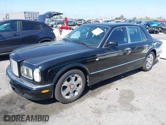 2001 Bentley Arnage with VIN SCBLC31E11CX06297, listed as a IAAI auction lot 41980275 with 63,510 mi miles and . Bid and sale history available at DreamBid. Image 2.