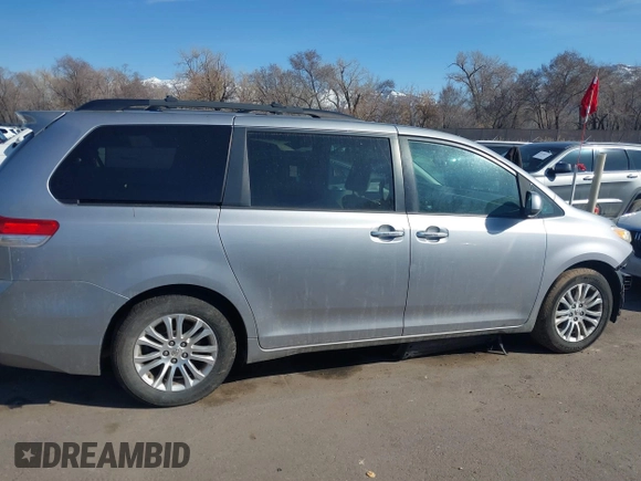 2011 Toyota Sienna XLE AAS with VIN 5TDYK3DC4BS014986, listed as a IAAI auction lot 41763681 with 169,619 mi miles. Bid and sale history available at carsss.com. Image 14.