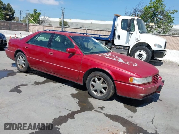 1996 Cadillac Seville Touring STS with VIN 1G6KY5290TU835414, listed as a IAAI auction lot 42051767 with 185,798 mi miles. Bid and sale history available at carsss.com. Image 1.