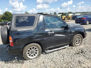 2000 Suzuki Vitara JLS z VIN 2S3TC52CXY6106646, wystawiony jako Copart lot #72450524 z przebiegiem 167 812 mil mil oraz Szkody całkowita. Historia ofert i sprzedaży dostępna na DreamBid. Obrazek 3.