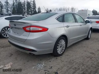 2014 Ford Fusion Energi Titanium with VIN 3FA6P0SU8ER256924, listed as a IAAI auction lot 41460304 with 1 mi miles. Bid and sale history available at carsss.com. Image 4.