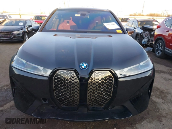 2023 BMW iX M60 with VIN WB533CF05PCM19091, listed as a IAAI auction lot 41223322 with 15,916 mi miles. Bid and sale history available at carsss.com. Image 13.
