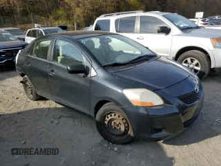 2009 Toyota Yaris with VIN JTDBT903891332421, listed as a Copart auction lot 78728194 with 138,666 mi miles and Salvage Title. Bid and sale history available at carsss.com. Image 4.