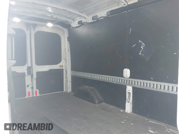 2019 Ford Transit with VIN 1FTBW2CM3KKB73018, listed as a IAAI auction lot 42240275 with 111,649 mi miles and . Bid and sale history available at DreamBid. Image 8.