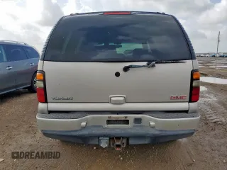2004 GMC Yukon Denali z VIN 1GKEK63U84J298285, wystawiony jako Copart lot #59865815 z przebiegiem 168 414 mil mil oraz Czysty tytuł • Clean title. Historia ofert i sprzedaży dostępna na DreamBid. Obrazek 6.