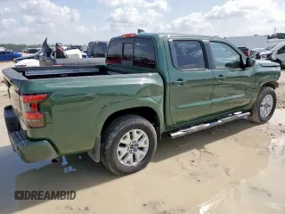 2022 Nissan Frontier Pro-4X with VIN 1N6ED1EK5NN691351, listed as a Copart auction lot 65206915 with 64,610 mi miles and Salvage title. Bid and sale history available at DreamBid. Image 3.