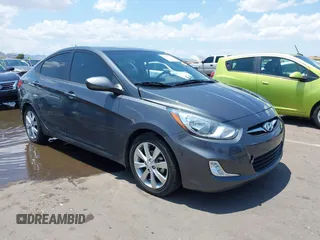 2012 Hyundai Accent GLS z VIN KMHCU4AE1CU107232, wystawiony jako IAAI lot #42409828 z przebiegiem 40 613 mil mil oraz . Historia ofert i sprzedaży dostępna na DreamBid. Obrazek 1.