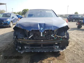 2022 BMW iX xDrive50 z VIN WB523CF08NCK55313, wystawiony jako Copart lot #47617474 z przebiegiem 22 610 mil mil oraz . Historia ofert i sprzedaży dostępna na DreamBid. Obrazek 5.