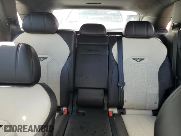 2021 Bentley Bentayga V8 z VIN SJAAM2ZV4MC034001, wystawiony jako Copart lot #78093424 z przebiegiem Nie podano mil oraz Szkoda całkowita • Salvage title. Historia ofert i sprzedaży dostępna na DreamBid. Obrazek 10.