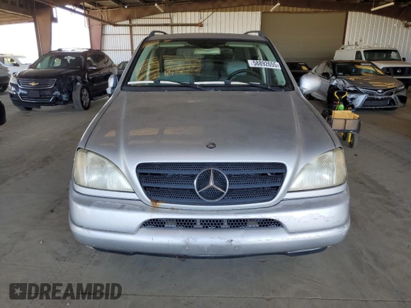 2001 Mercedes-Benz M 320/430/500 with VIN 4JGAB72E61A260183, listed as a Copart auction lot 58892655 with 71,651 mi miles and Clean title. Bid and sale history available at DreamBid. Image 5.