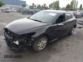 2014 Mazda 3 i Touring with VIN JM1BM1L73E1172987, listed as a IAAI auction lot 42111043 with 121,168 mi miles and . Bid and sale history available at DreamBid. Image 18.