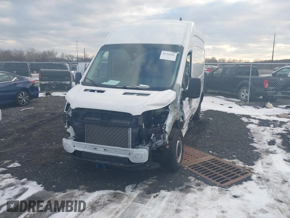 2023 Ford Transit Cargo with VIN 1FTBW1X83PKC09336, listed as a IAAI auction lot 41299101 with 10,551 mi miles and . Bid and sale history available at DreamBid. Image 12.