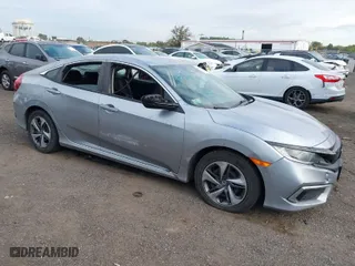 2019 Honda Civic Sedan LX with VIN 2HGFC2F65KH586106, listed as a IAAI auction lot 40486735 with 82,714 mi miles. Bid and sale history available at carsss.com. Image 1.