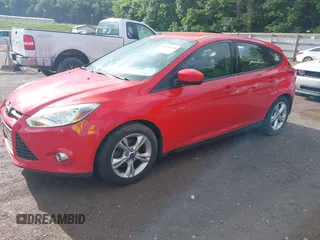 2012 Ford Focus SE z VIN 1FAHP3K21CL444088, wystawiony jako IAAI lot #42242725 z przebiegiem 145 604 mil mil oraz . Historia ofert i sprzedaży dostępna na DreamBid. Obrazek 2.