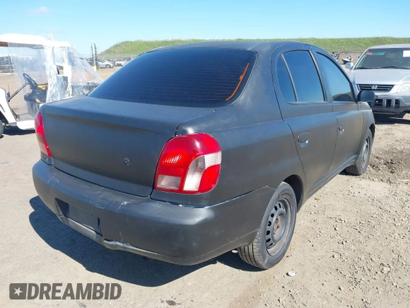 2002 Toyota ECHO with VIN JTDBT123120243848, listed as a IAAI auction lot 41677515 with 287,759 mi miles. Bid and sale history available at carsss.com. Image 4.