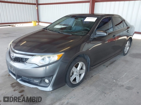 2012 Toyota Camry L with VIN 4T1BF1FKXCU617498, listed as a IAAI auction lot 42114337 with 323,770 mi miles. Bid and sale history available at carsss.com. Image 2.