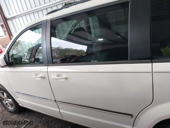 2009 Dodge Grand Caravan SXT with VIN 2D8HN54X89R512618, listed as a IAAI auction lot 41486547 with 116,979 mi miles. Bid and sale history available at carsss.com. Image 14.