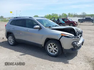 2015 Jeep Cherokee Latitude z VIN 1C4PJMCB0FW505235, wystawiony jako IAAI lot #42220775 z przebiegiem 115 459 mil mil oraz . Historia ofert i sprzedaży dostępna na DreamBid. Obrazek 1.
