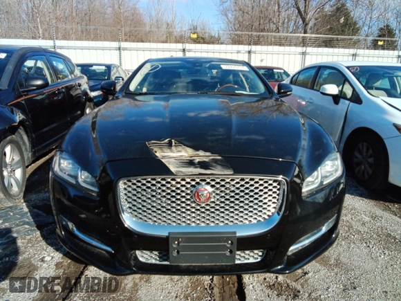 2016 Jaguar XJ Portfolio with VIN SAJWJ2GD8G8V92997, listed as a Copart auction lot 72420774 with 74,934 mi miles and Salvage title. Bid and sale history available at DreamBid. Image 5.