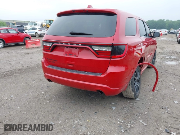 2015 Dodge Durango SXT with VIN 1C4RDJAG2FC128082, listed as a IAAI auction lot 42447872 with 141,655 mi miles and . Bid and sale history available at DreamBid. Image 4.
