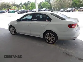 2016 Volkswagen Jetta Sedan 1.8T SEL with VIN 3VWL07AJ5GM310789, listed as a IAAI auction lot 41596429 with 169,910 mi miles. Bid and sale history available at carsss.com. Image 3.