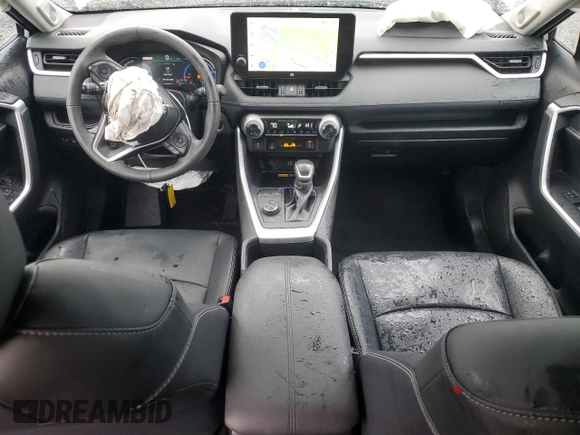 2024 Toyota RAV4 Hybrid XLE Premium with VIN 2T3B6RFV6RW066043, listed as a Copart auction lot 43470115 with 9,454 mi miles and Salvage Title. Bid and sale history available at DreamBid. Image 8.