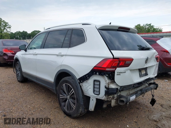 2019 Volkswagen Tiguan SE with VIN 3VV3B7AX6KM018161, listed as a IAAI auction lot 42279398 with 96,534 mi miles and . Bid and sale history available at DreamBid. Image 3.