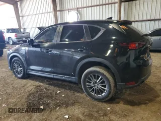 2017 Mazda CX-5 Sport with VIN JM3KFABL9H0210264, listed as a Copart auction lot 87918795 with 129,827 mi miles and Salvage Title. Bid and sale history available at carsss.com. Image 2.