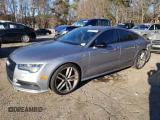 2018 Audi A7 z VIN WAUW3BFC8JN090059, wystawiony jako Copart lot #42802324 z przebiegiem 60 752 mil mil oraz . Historia ofert i sprzedaży dostępna na DreamBid. Obrazek 1.
